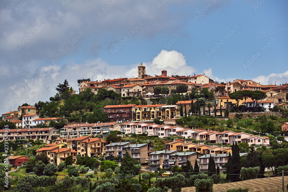 View of the houses and the church of the city of Montanio in Tuscany.