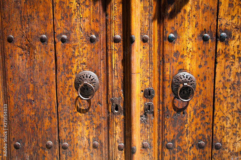 Fototapeta premium Background of antique wooden gate in Turkey,Antalya