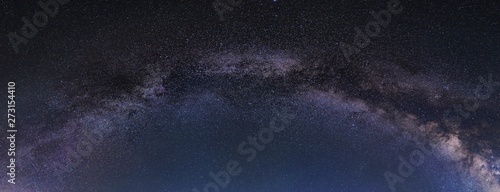 Night starry sky with colorful Milky Way at summer. Beautiful Universe.