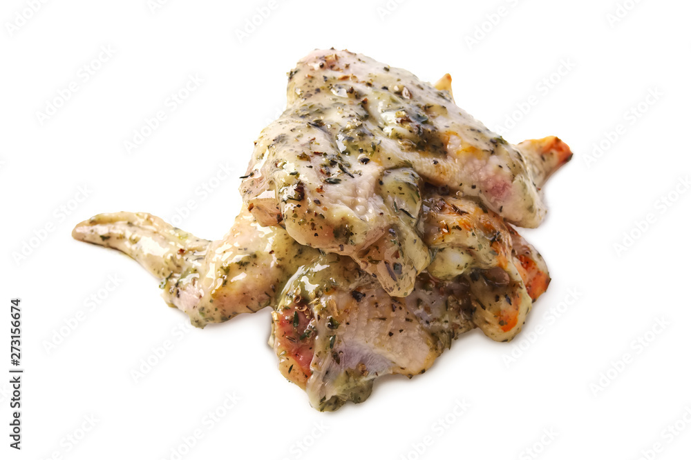 Raw piece of chicken with spice and sauce prepered for barbecue. Gastronomy template isolated on white background. Raw piece of chicken with spice and sauce prepered for barbecue. Gastronomy template isolated on white background.