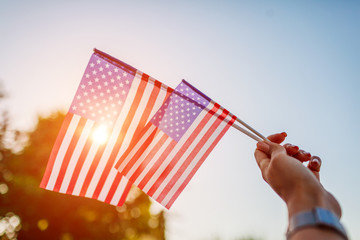 Woman holding USA flag. Celebrating Independence Day of America