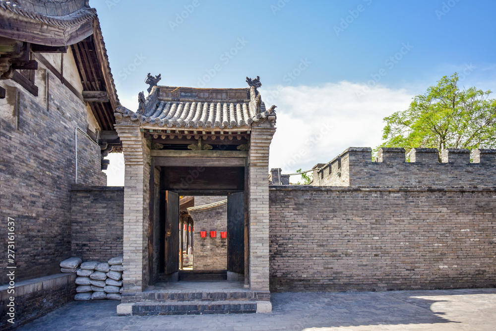 A Partial Close-up of Ancient Chinese Architectural Gateway, Pingyao Ancient City, Shanxi Province, China A Partial Close-up of Ancient Chinese Architectural Gateway, Pingyao Ancient City, Shanxi Province, China