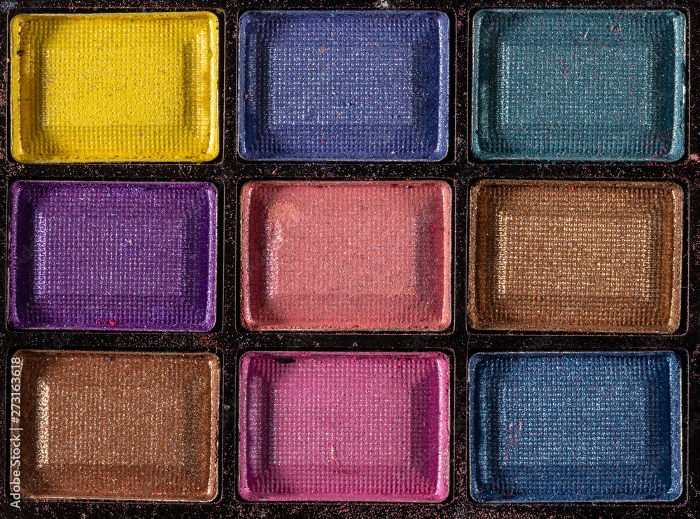 Fototapeta premium Colorful eye shadows palette. Makeup background. close up