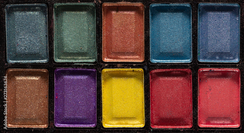 Colorful eye shadows palette. Makeup background. close up Colorful eye shadows palette. Makeup background. close up