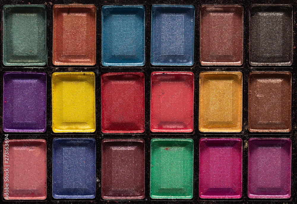 Colorful eye shadows palette. Makeup background. close up Colorful eye shadows palette. Makeup background. close up