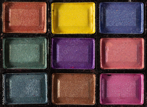 Colorful eye shadows palette. Makeup background. close up