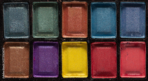 Colorful eye shadows palette. Makeup background. close up
