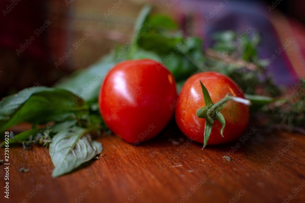 fresh cherry tomatoes on a wooden board fresh cherry tomatoes on a wooden board