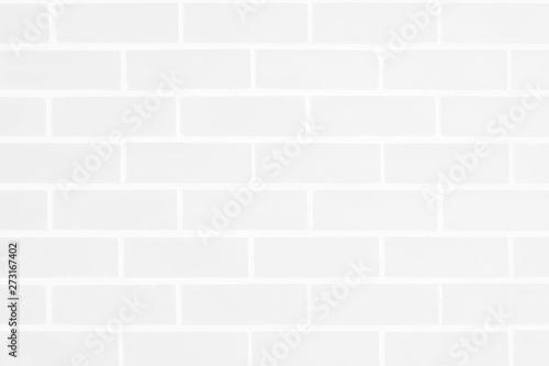 Abstract weathered white brick wall texture for background in room