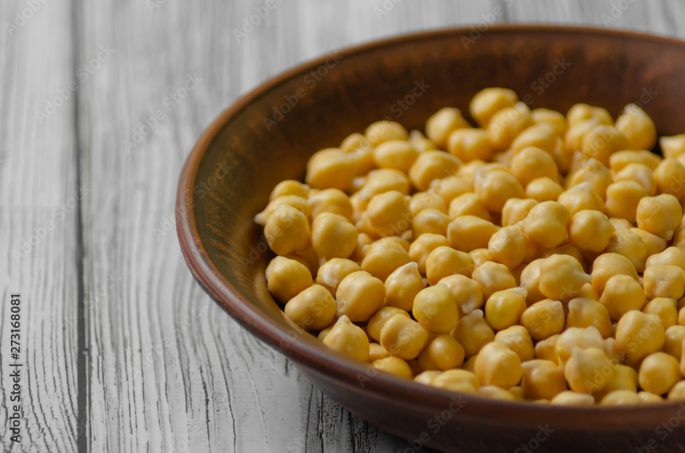 chickpeas raw in a clay plate after soaking chickpeas raw in a clay plate after soaking