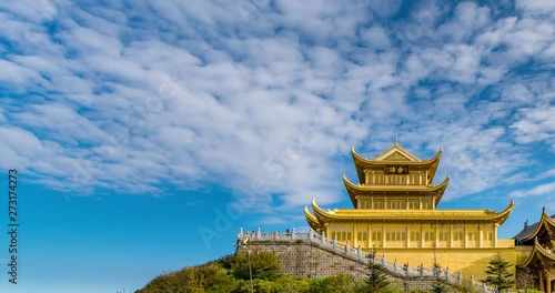 Time-lapse photography of the golden roof of Emei Mountain in Sichuan Province, China photo