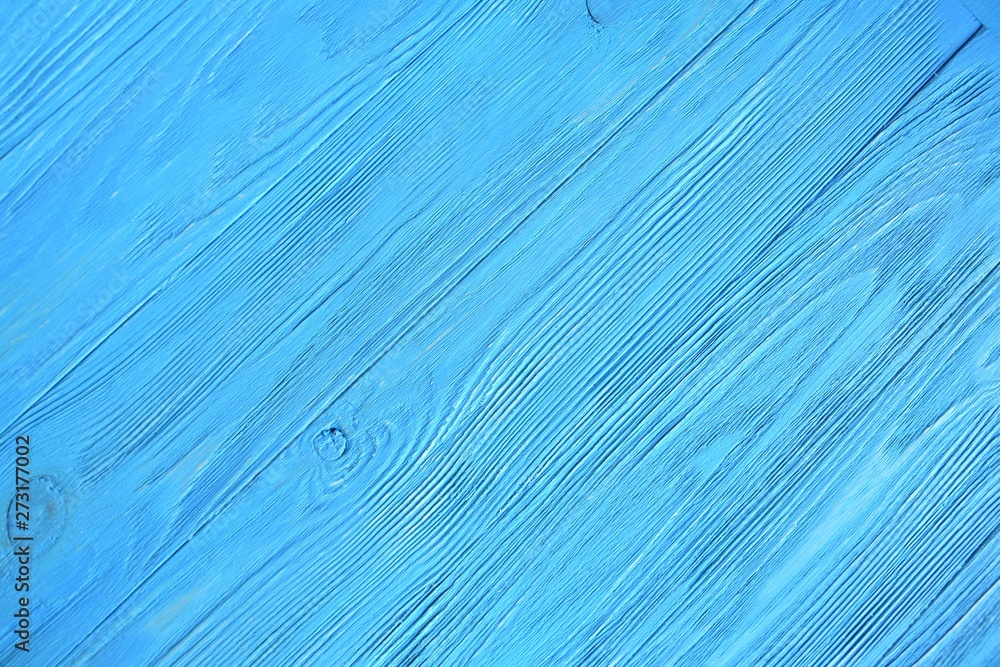 Bright blue textured wood background. Empty wooden backdrop with rough ...