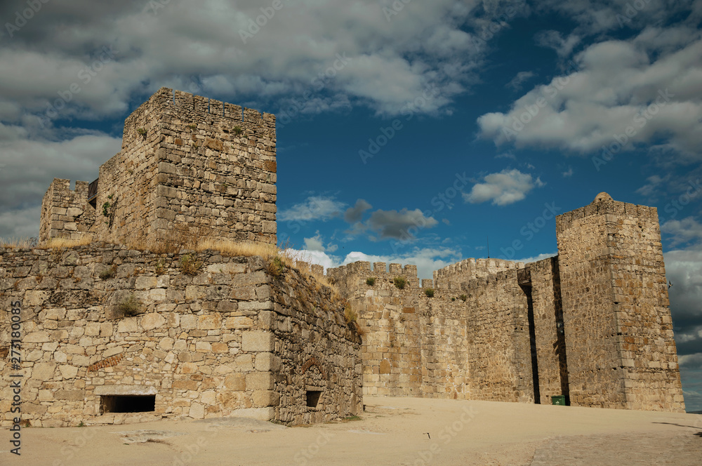 Towers and stone walls facade at the Castle of Trujillo Towers and stone walls facade at the Castle of Trujillo