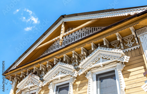 Facade of an old house decorated with wooden carvings