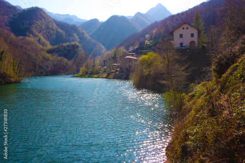 the romantic lake of Isola Santa in Tuscany, in the mountains of the Apuan Alps. panorama out of focus with a bit of mist photo