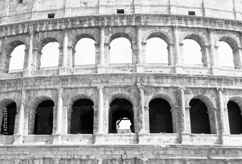 Black and white photo of Colosseum in Rome - Flavian Amphitheatre closeup, Italy, Europe.