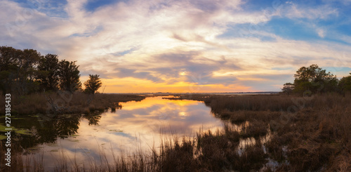 Panoramic sunset over wetlands at Assateague Island in Maryland © Michael