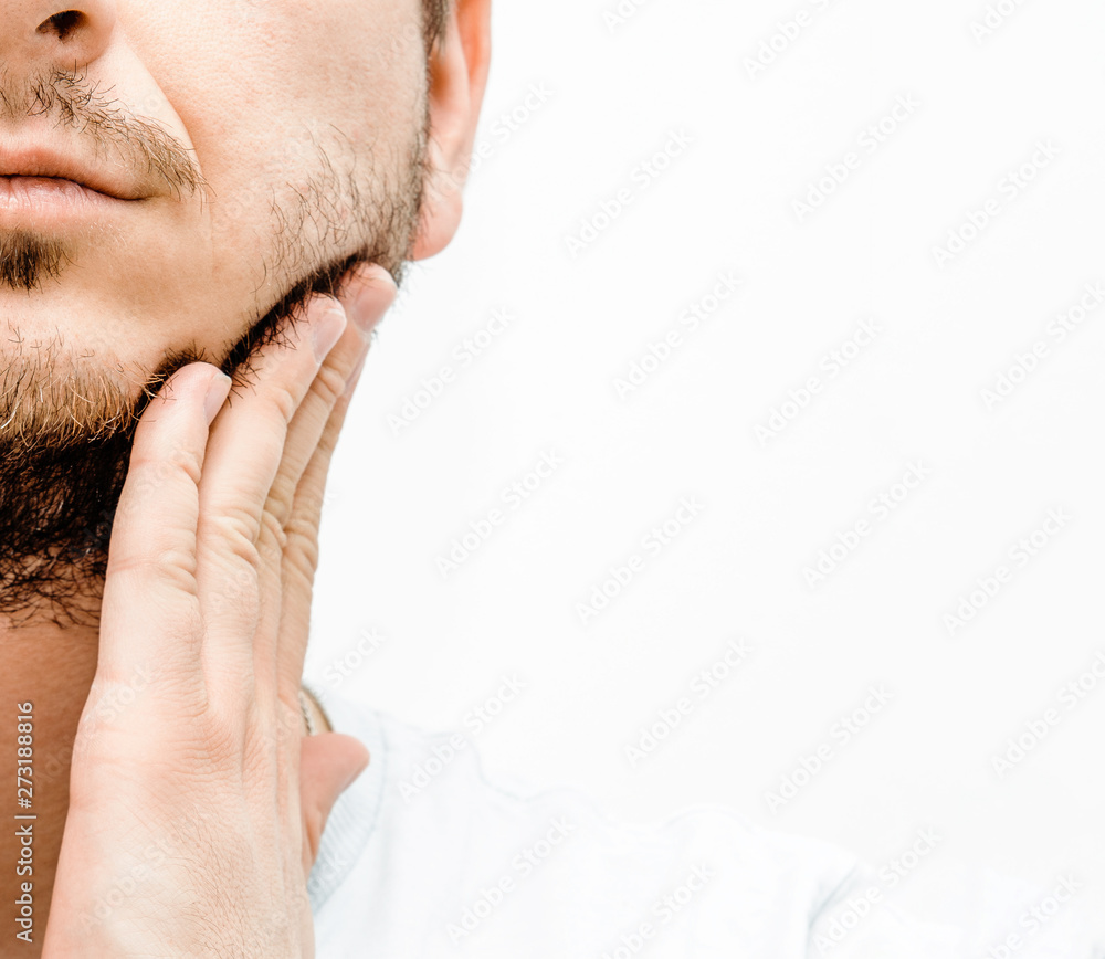 Fototapeta premium Before and after facial hair of a man on a bright white background. The concept of personal hygiene in a man. A man with a beard and no beard. Shaving and taking care of facial hair.