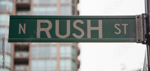 A sign depicting Rush Street in Chicago, Illinois