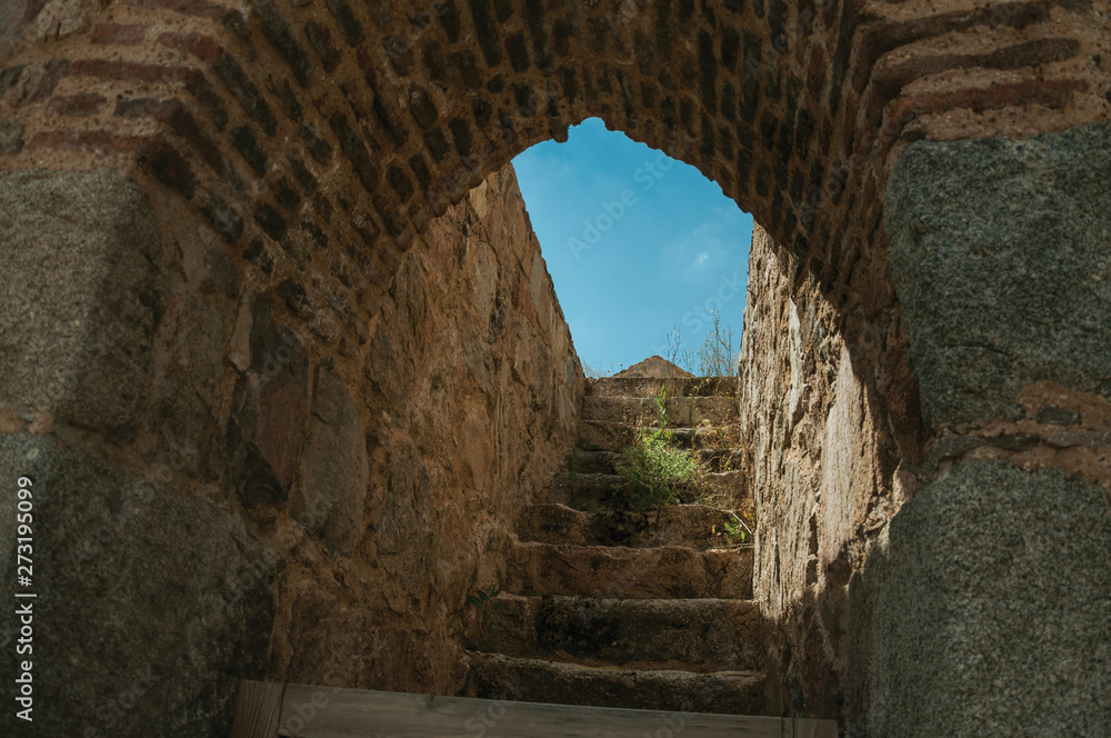 Staircase going up to a bricks watchtower at Avila