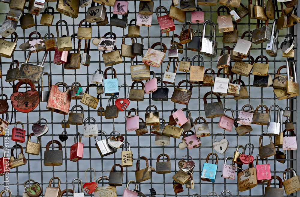 Fototapeta premium Love locks on a fence of a bridge