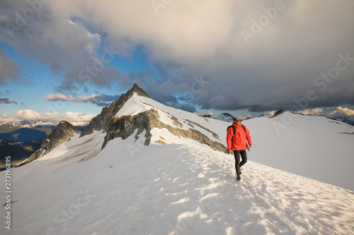 Mountaineer descends from summit of Cypress Peak, B.C. photo