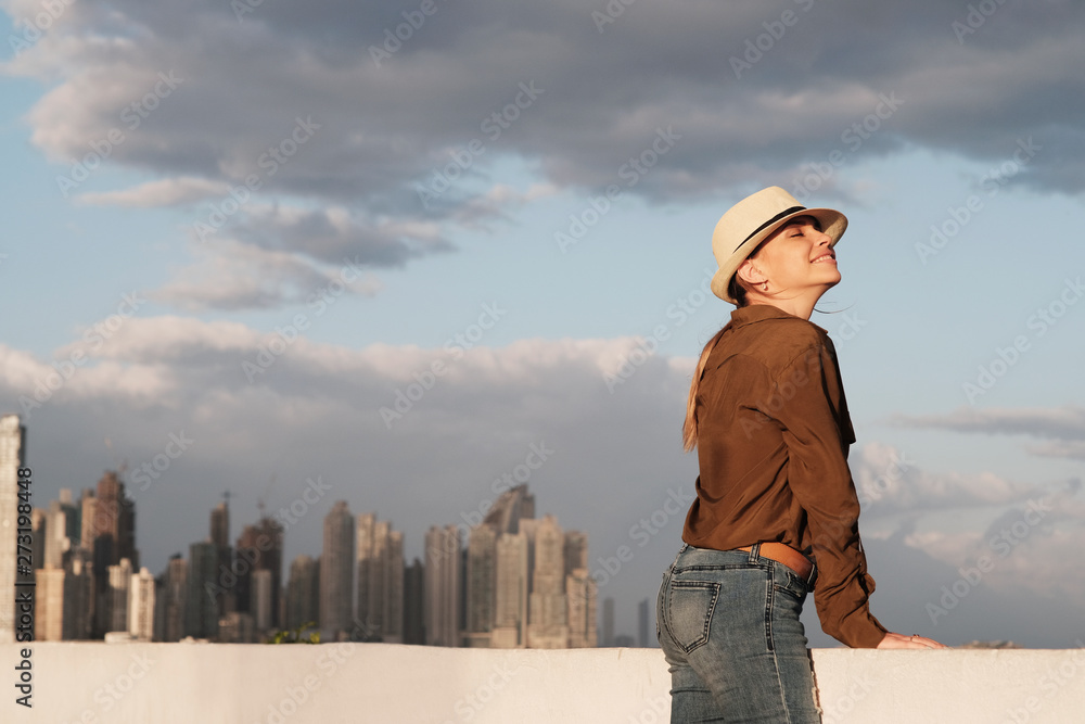 City Skyline and Woman With Closed Eyes Breathing Fresh Air City Skyline and Woman With Closed Eyes Breathing Fresh Air