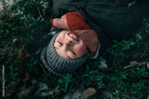 Girl lying in the grass photo