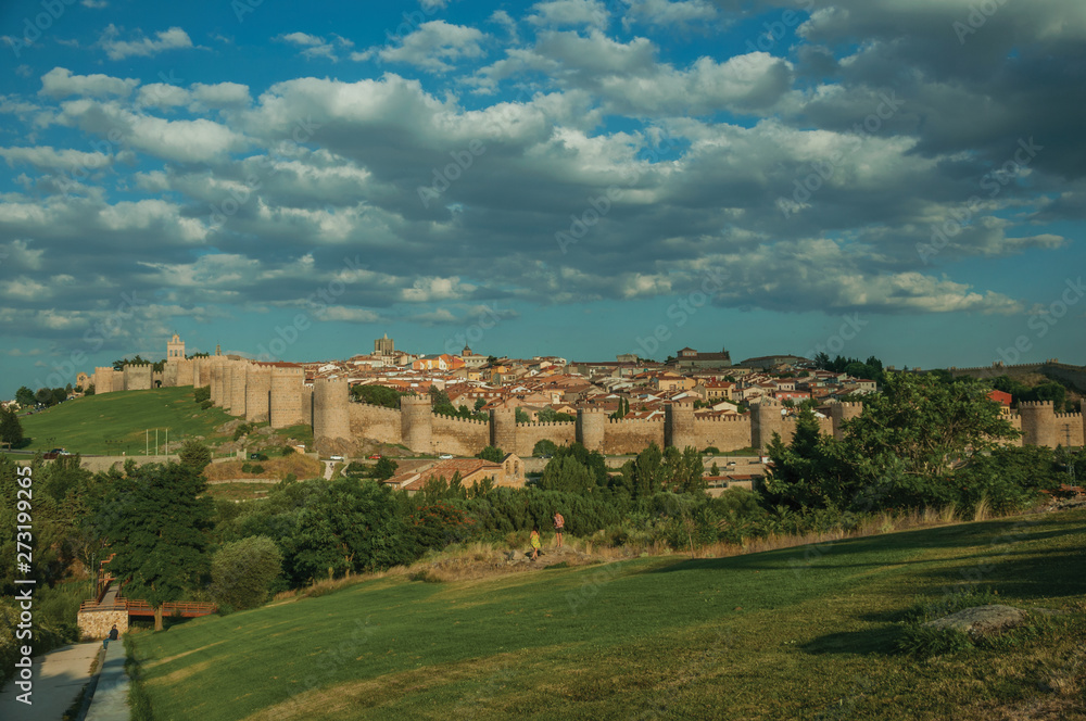 City landscape with large stone wall and towers at Avila