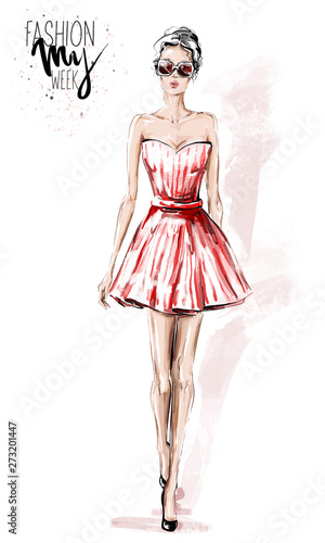 Hand drawn beautiful young woman in red dress. Stylish elegant girl. Fashion woman look. Sketch. Fashion illustration.