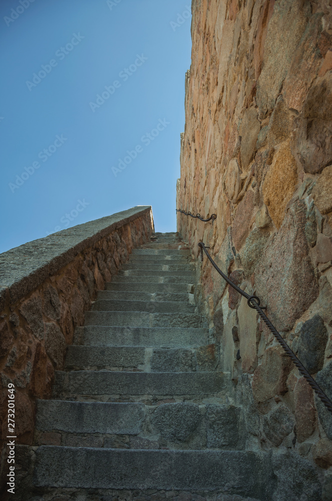 Staircase going up towards a thick wall in Avila
