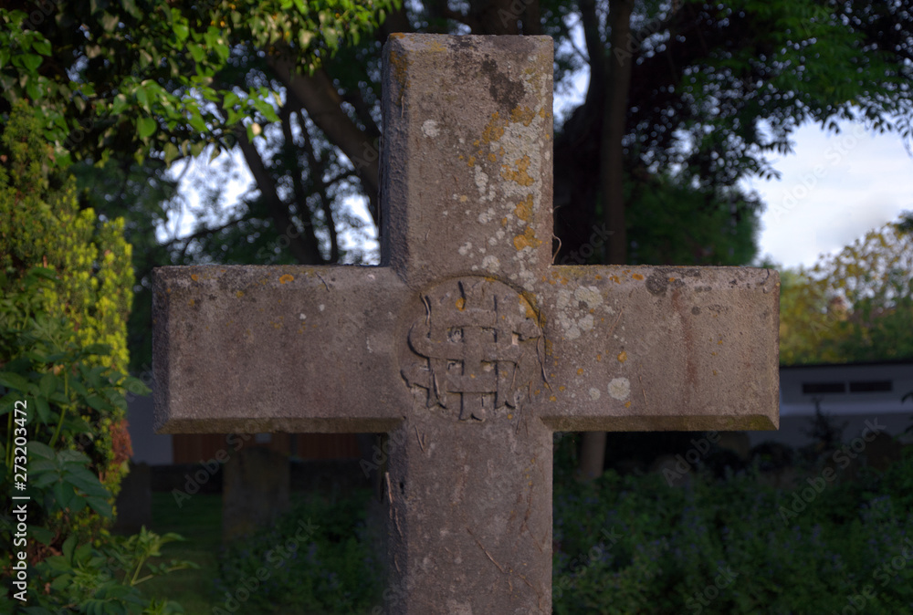 Grave stone in shape of cross