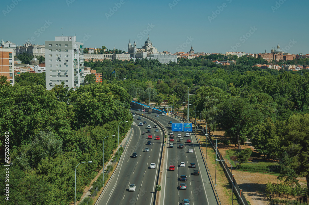 Highway with heavy traffic and trees in Madrid