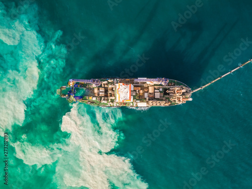 Aerial view of sand dredging boat in Persian Gulf, Dubai, UAE. photo