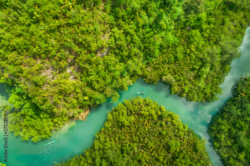 Aerial view of traditional fishing boats in Bojo River, Aloguinsan, Philippines. photo