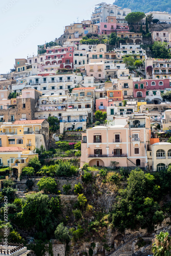 Panorama of Positano with houses climbing up the hill, Campania, Italy