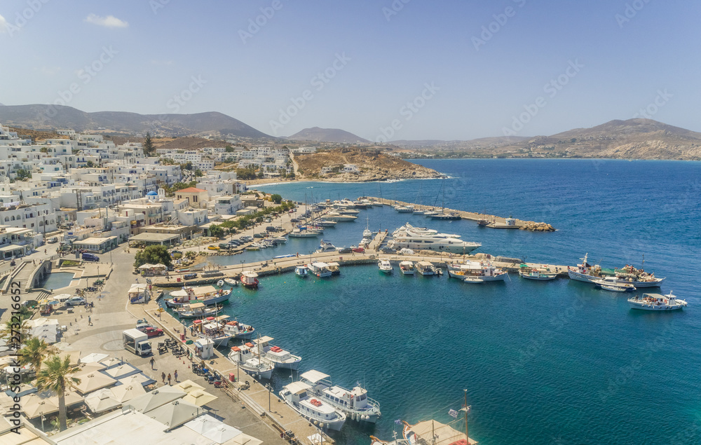 Aerial view of Naoussa city, with traditional white houses, Greece.