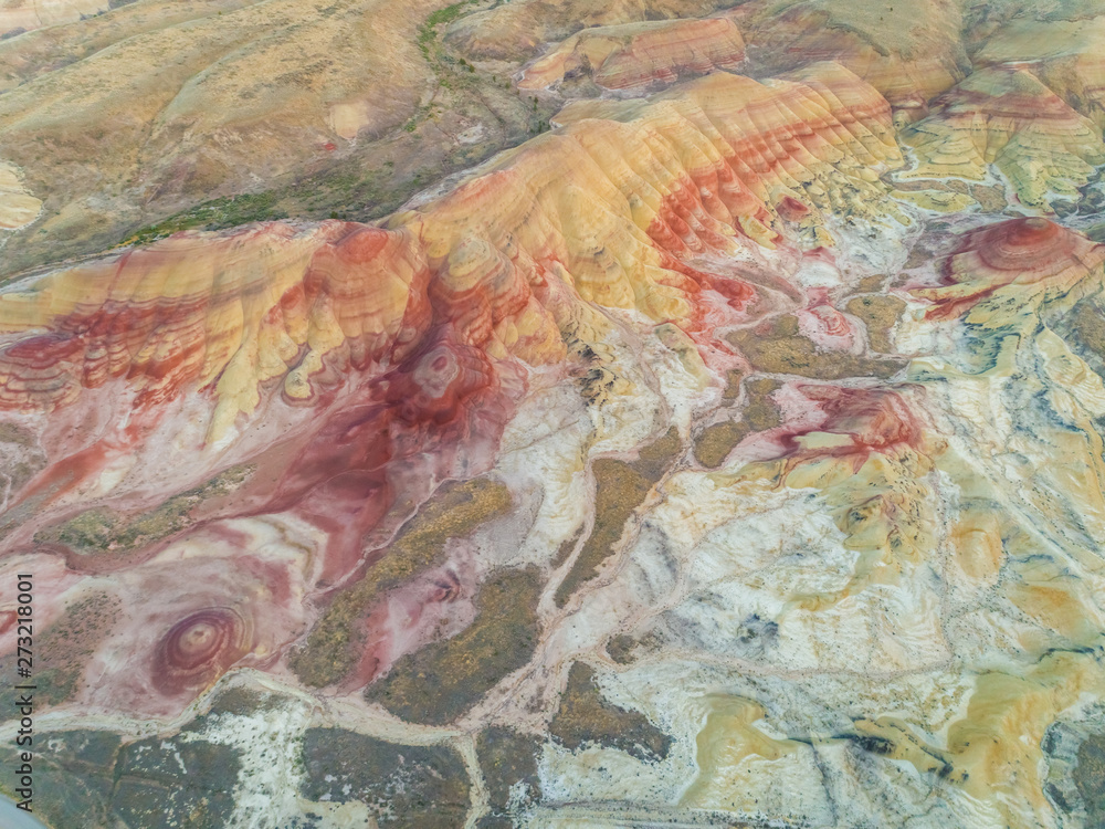 Aerial view above of Painted Hills rock formation, Oregon, U.S.A. Aerial view above of Painted Hills rock formation, Oregon, U.S.A.