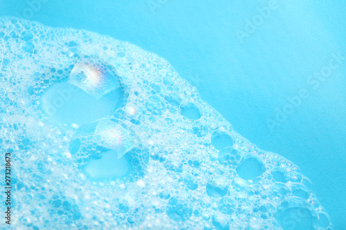 Background soap suds (foam) and bubbles from detergent. House cleaning concept. © Andrii Zastrozhnov