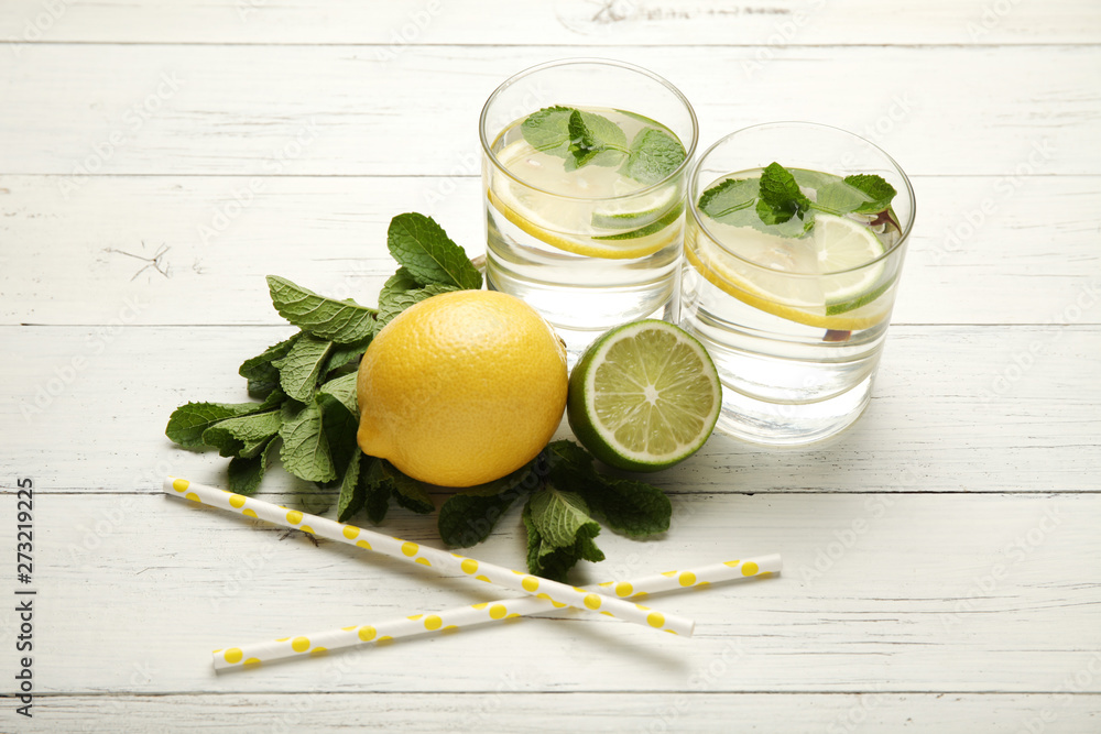 Fototapeta premium Fresh detox lemon water, healthy drink. Summer citrus lemonade.