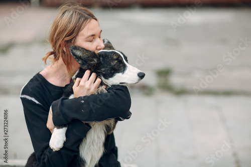 Corgi welsh cardigan puppy dog and young woman