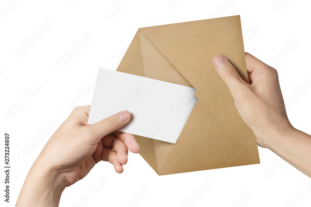 Hands pulling a blank sheet of paper (letter, ticket, flyer, invitation, coupon, banknote, etc.) out a brown envelope, isolated on white background