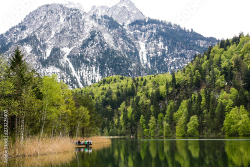 Beautiful landscape of lake Schwansee on a background of mountains. Bavaria, Germany