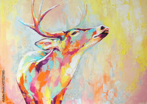 Oil deer portrait painting in multicolored tones. Conceptual abstract painting of a deer muzzle. Closeup of a painting by oil and palette knife on canvas.