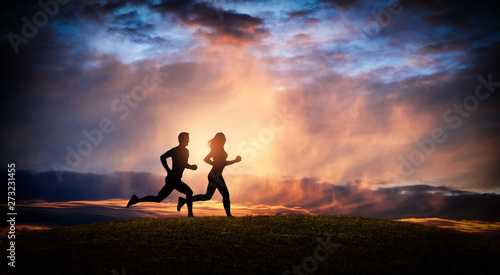 Young couple run together o...