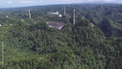 The big one. The largest radio telescope in the world, the Arecibo Observatory stands as a marvel of engineering and science. (aerial view) photo