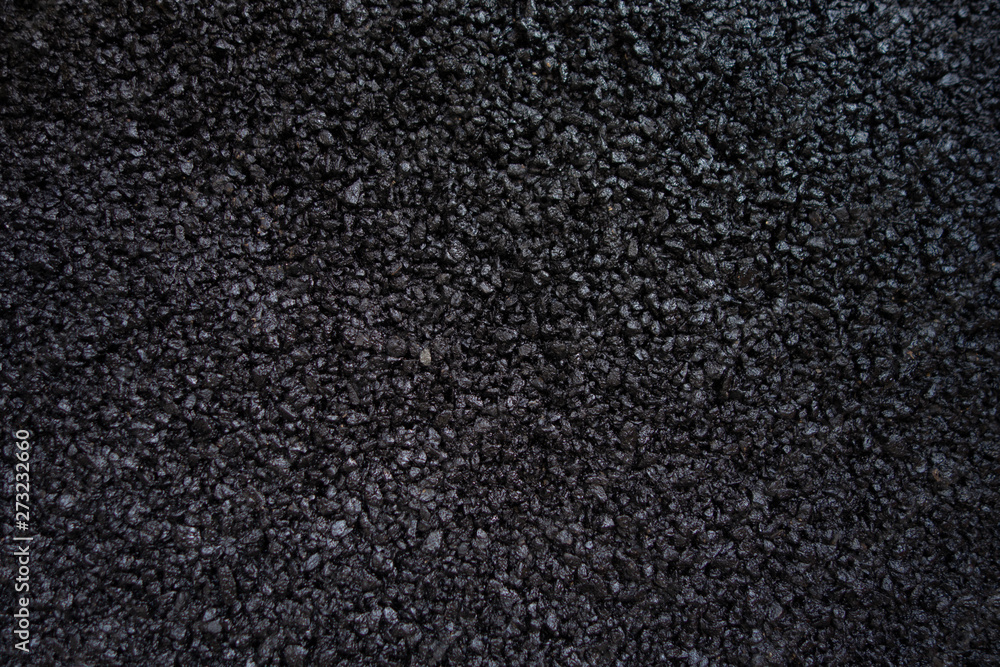 abstract background texture of raw blacktop material abstract background texture of raw blacktop material