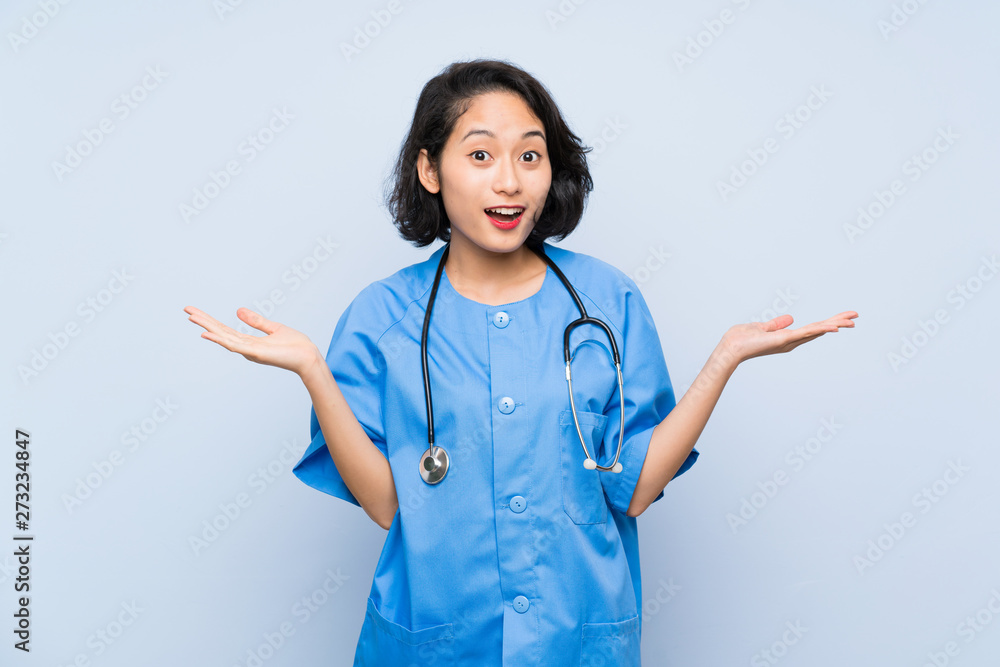 Surgeon doctor woman with shocked facial expression Surgeon doctor woman with shocked facial expression