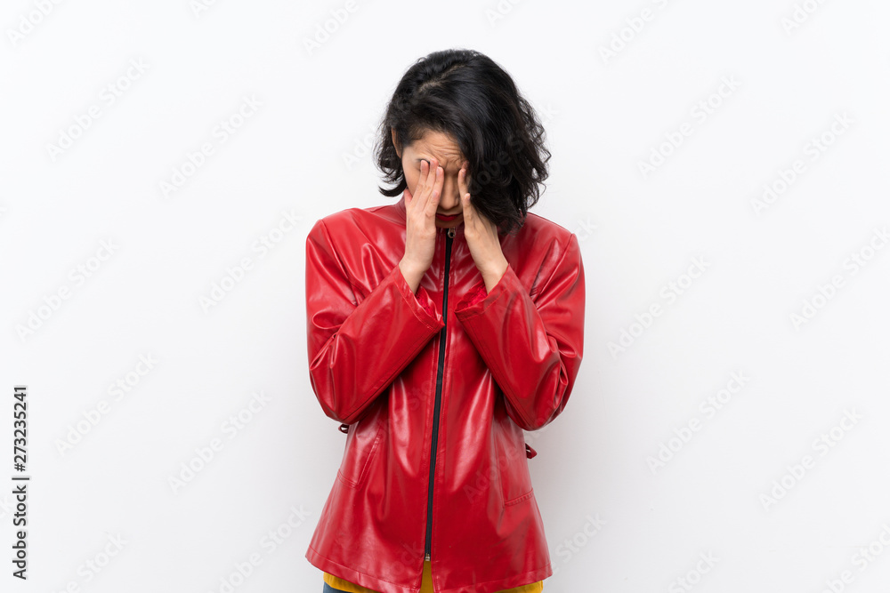 Asian young woman over isolated white background with tired and sick expression Asian young woman over isolated white background with tired and sick expression