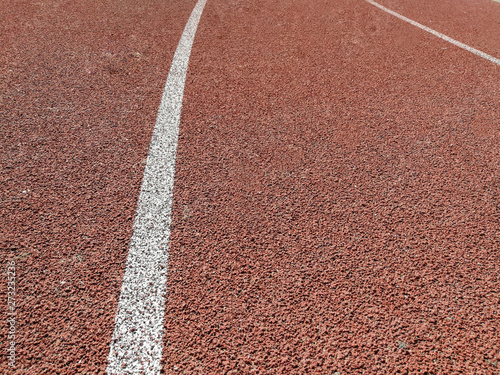 Jogging stadium surface close up